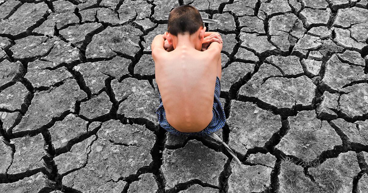 Child on desert wasteland