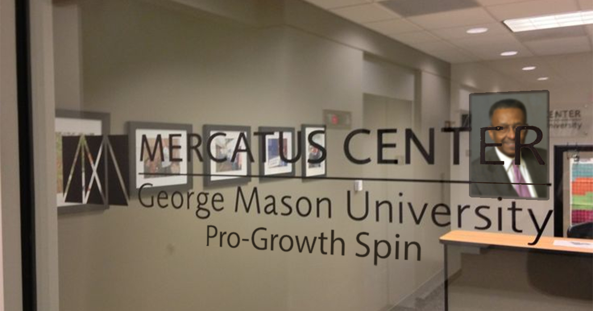 Mercatus Center pro-growth spin sign and Walter Williams portrait
